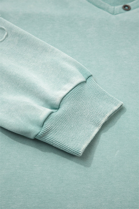Mineral Wash Snap Trim V Neck Exposed Seam Drop Shoulder Curved Hem Long Sleeve Top